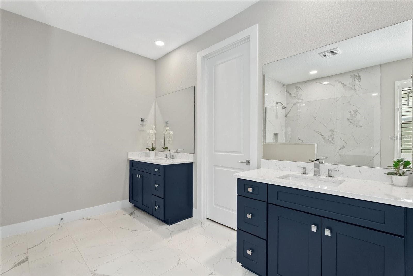 Primary Bathroom with Walk-in Closet and Linen Closet - 12801 MORNING MIST PL, VENICE