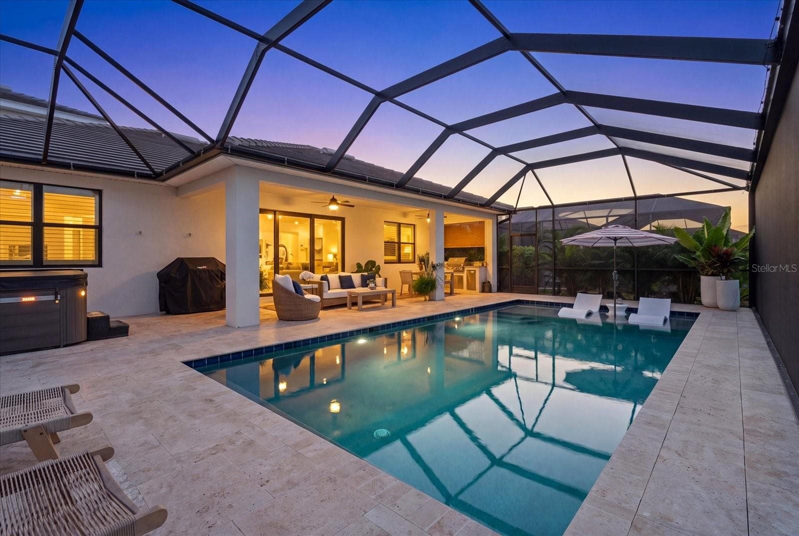 Virtual Twilight Photo of the Lanai and Pool - 12801 MORNING MIST PL, VENICE