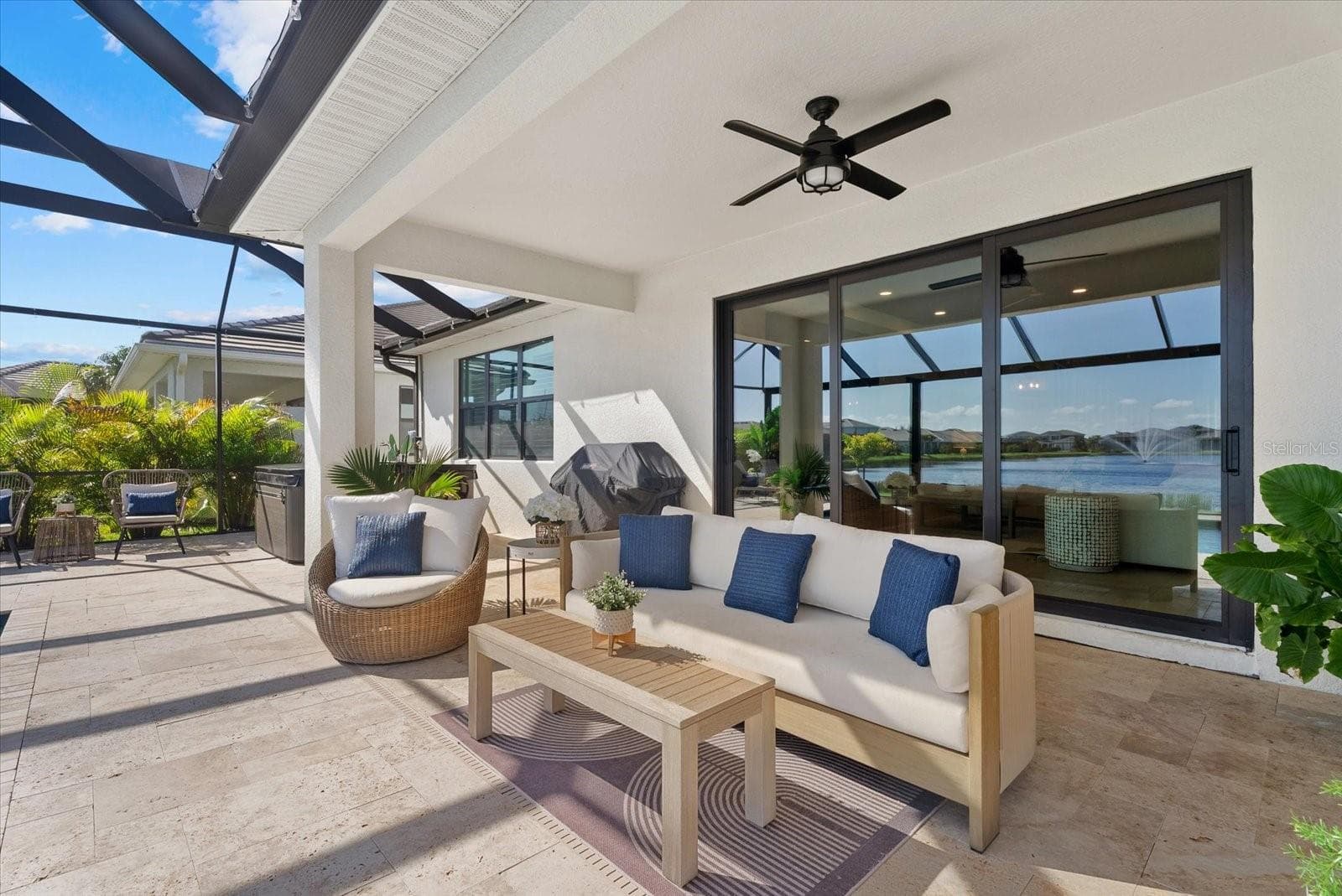 Covered Seating on the Lanai - 12801 MORNING MIST PL, VENICE