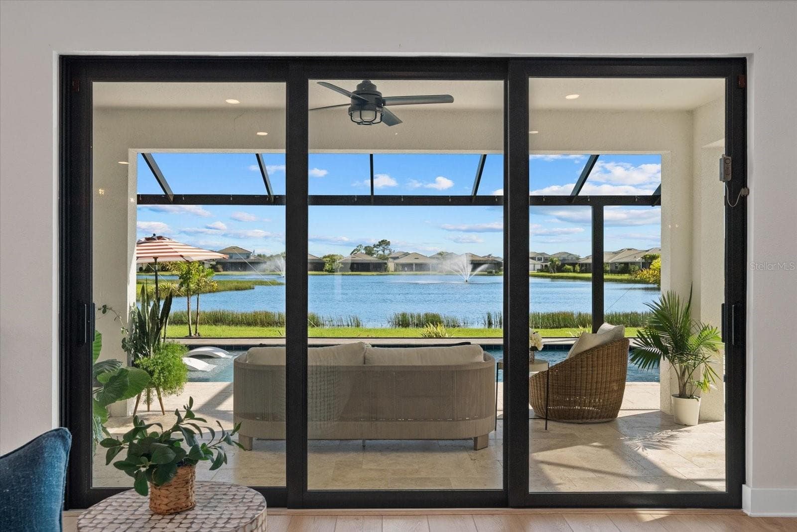 Large sliders in the Family Room for lots of natural light - 12801 MORNING MIST PL, VENICE