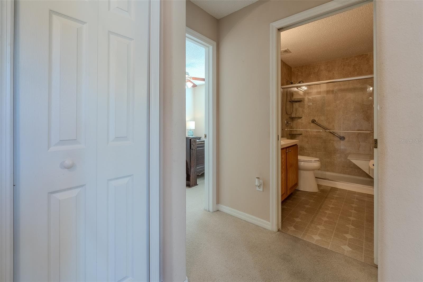 Master Closet view into toilet - 15547 SW 13TH CIR, OCALA