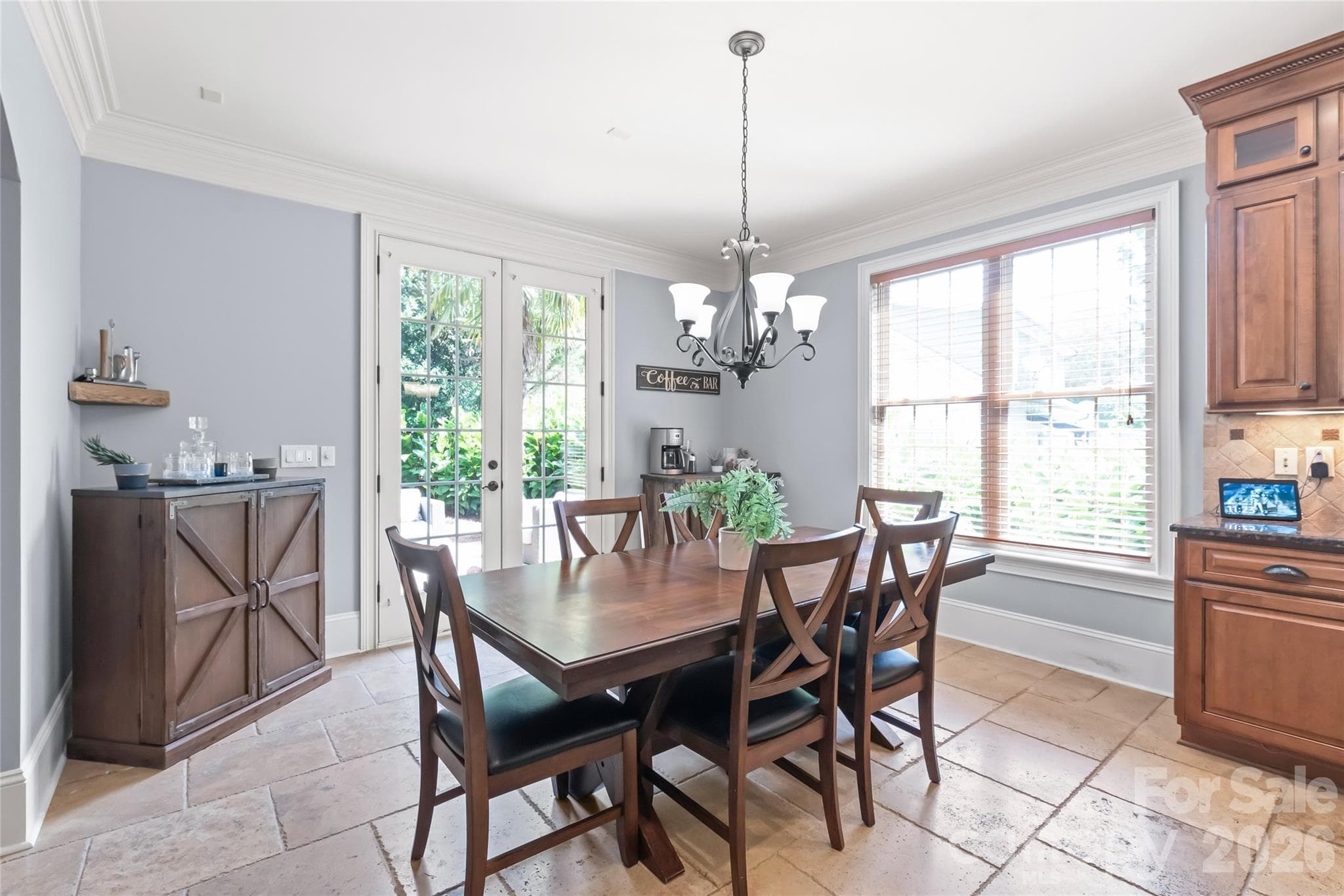 The cozy breakfast area provides the ideal setting for everyday dining and morning coffee. - 7320 Summerlin Place, Charlotte