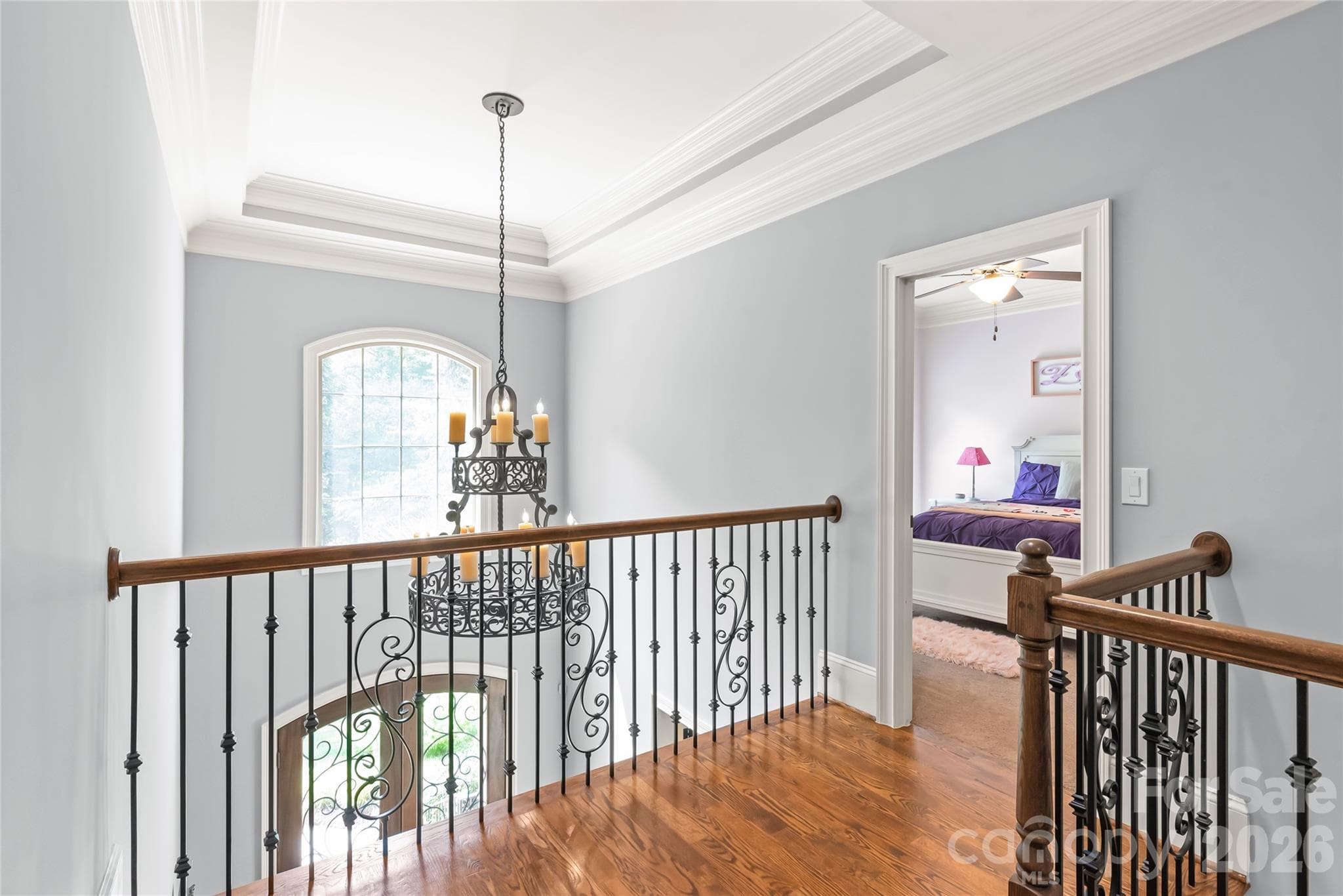 Tailored architectural details and high-end finishes throughout give the entire space a distinct, custom feel. - 7320 Summerlin Place, Charlotte