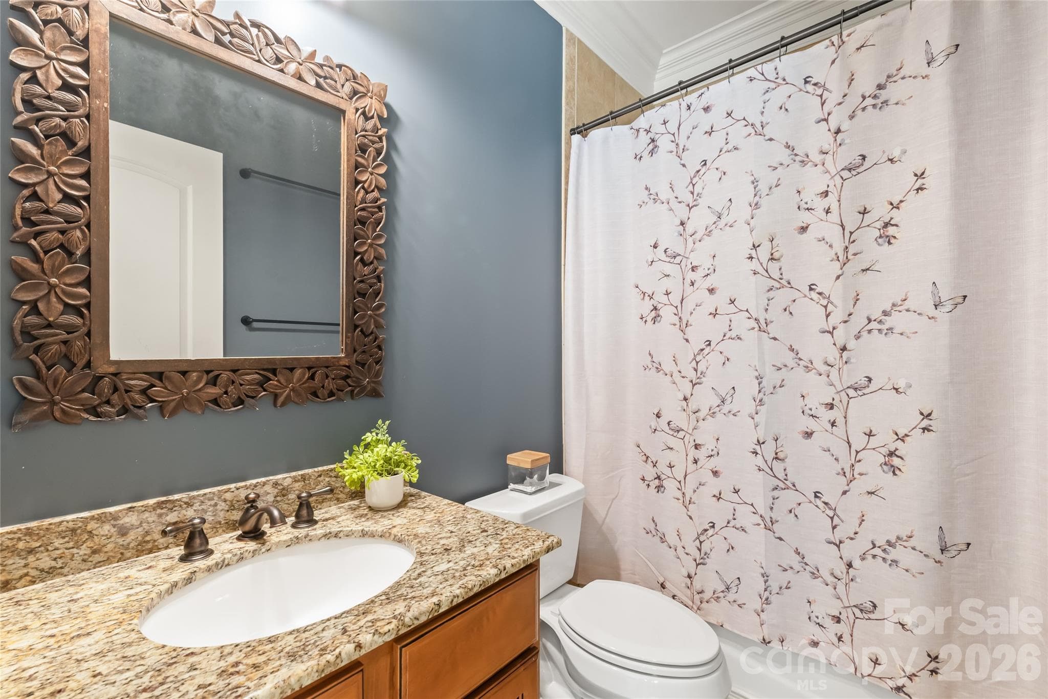 A dedicated full bath serves Bedroom four, offering complete privacy and comfort for family or guests. - 7320 Summerlin Place, Charlotte