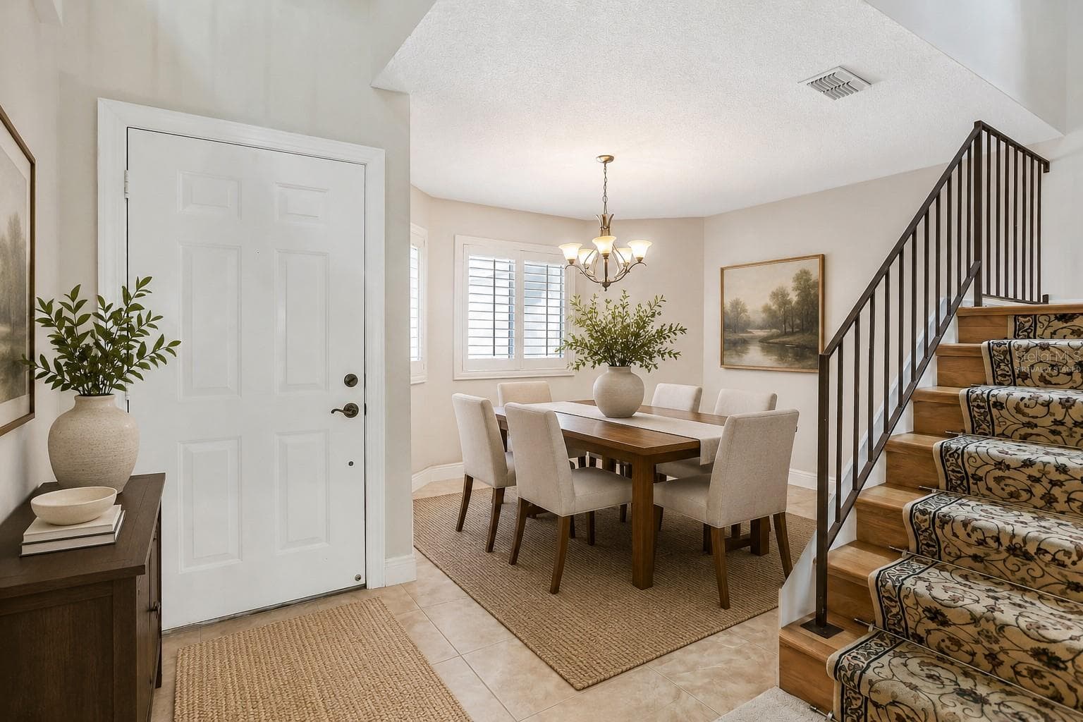 Virtually Staged foyer and dining room. - 605 CHESTNUT OAK CIR #107, ALTAMONTE SPRINGS