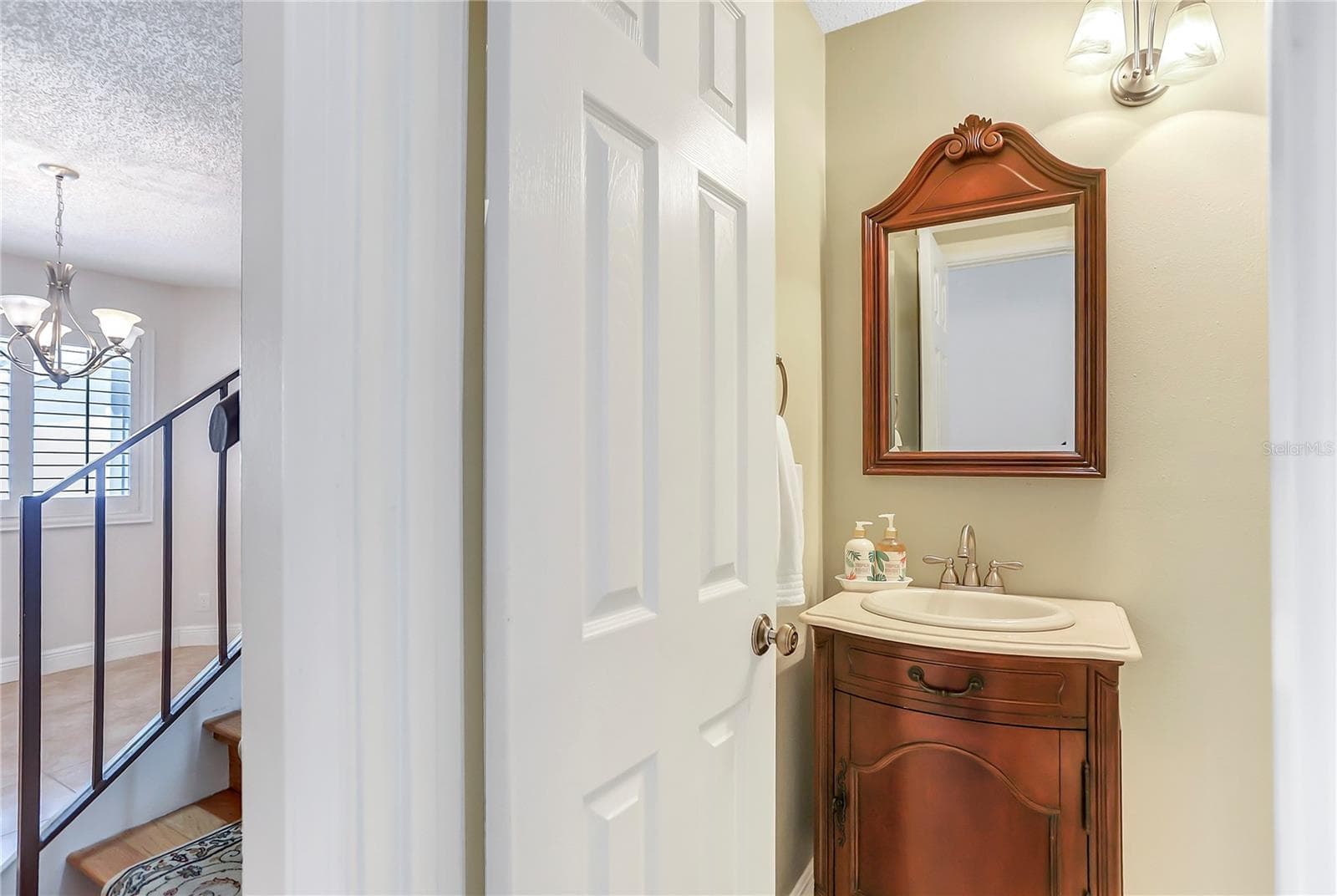 Downstairs half bath. - 605 CHESTNUT OAK CIR #107, ALTAMONTE SPRINGS