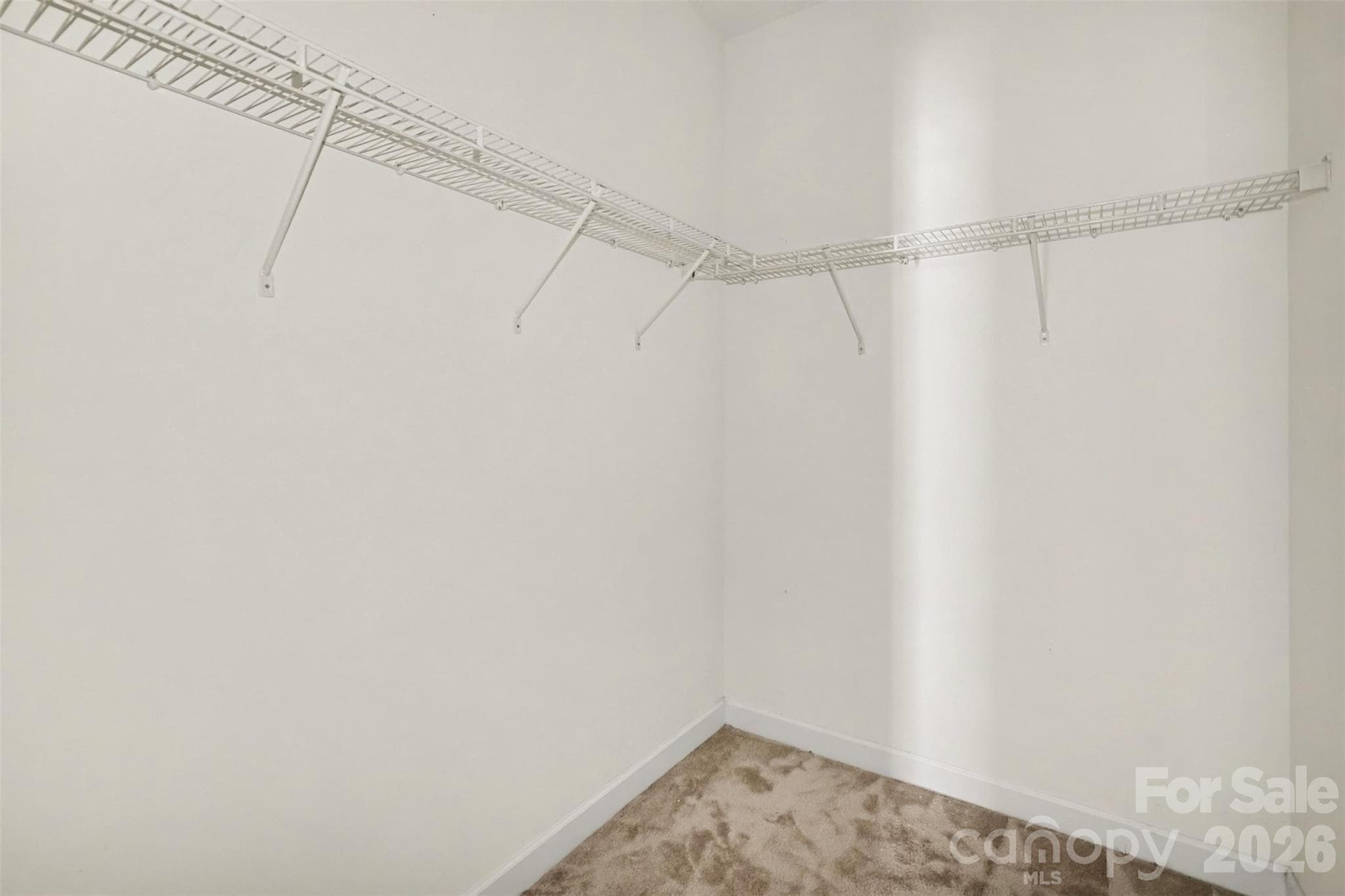 Primary walk-in closet - 15109 Jade Street, Charlotte