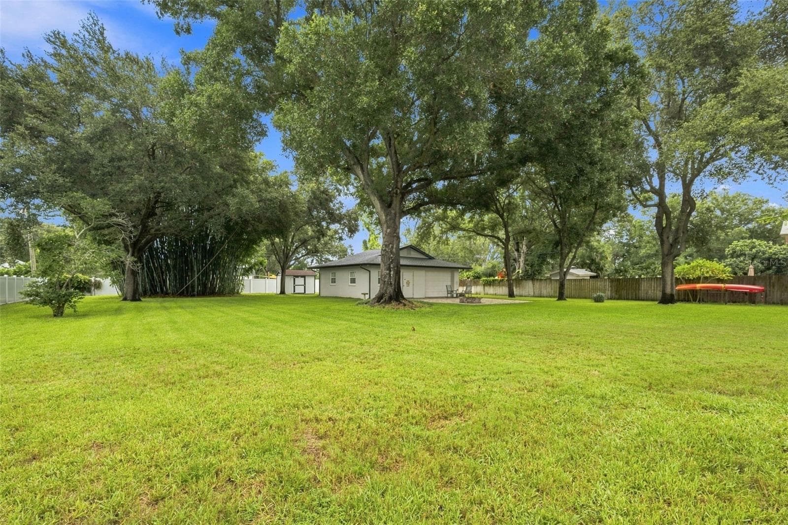 Tucked privately within the backyard, the air-conditioned detached structure with electricity is truly a standout feature of the property. - 13123 108TH AVE, LARGO
