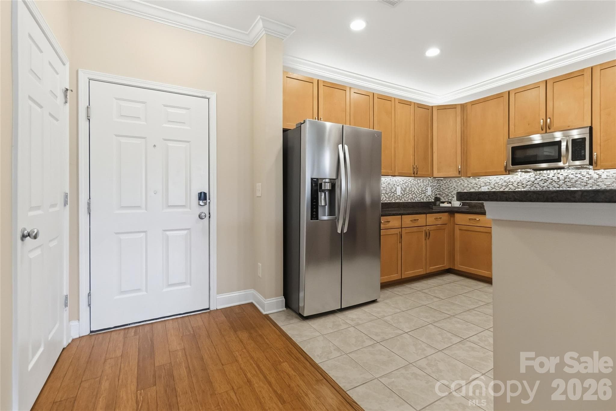 Front door and kitchen - 1000 E Woodlawn Road, Charlotte