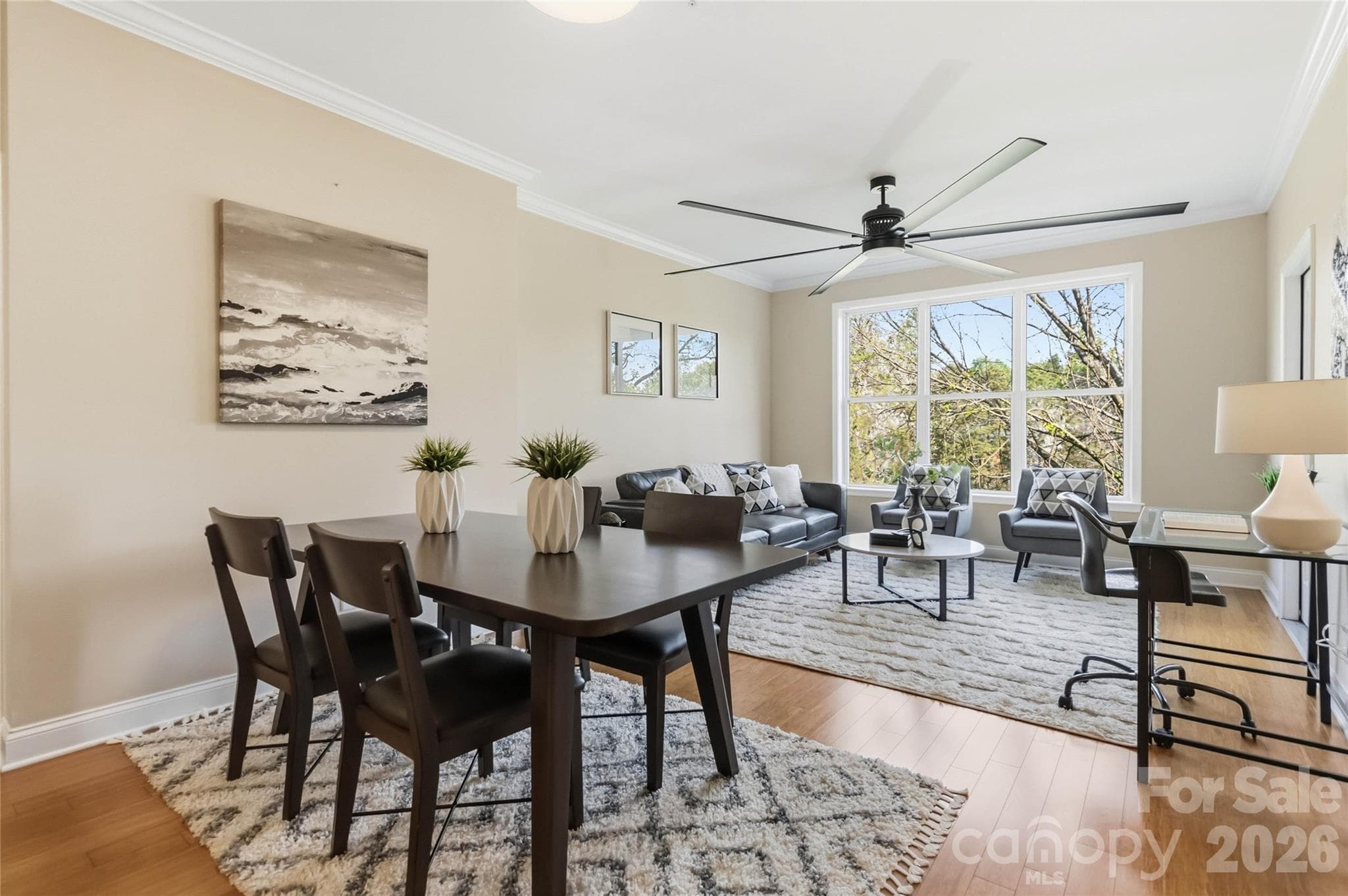 Staging has been removed, and the ceiling fan is now a smaller fan. - 1000 E Woodlawn Road, Charlotte