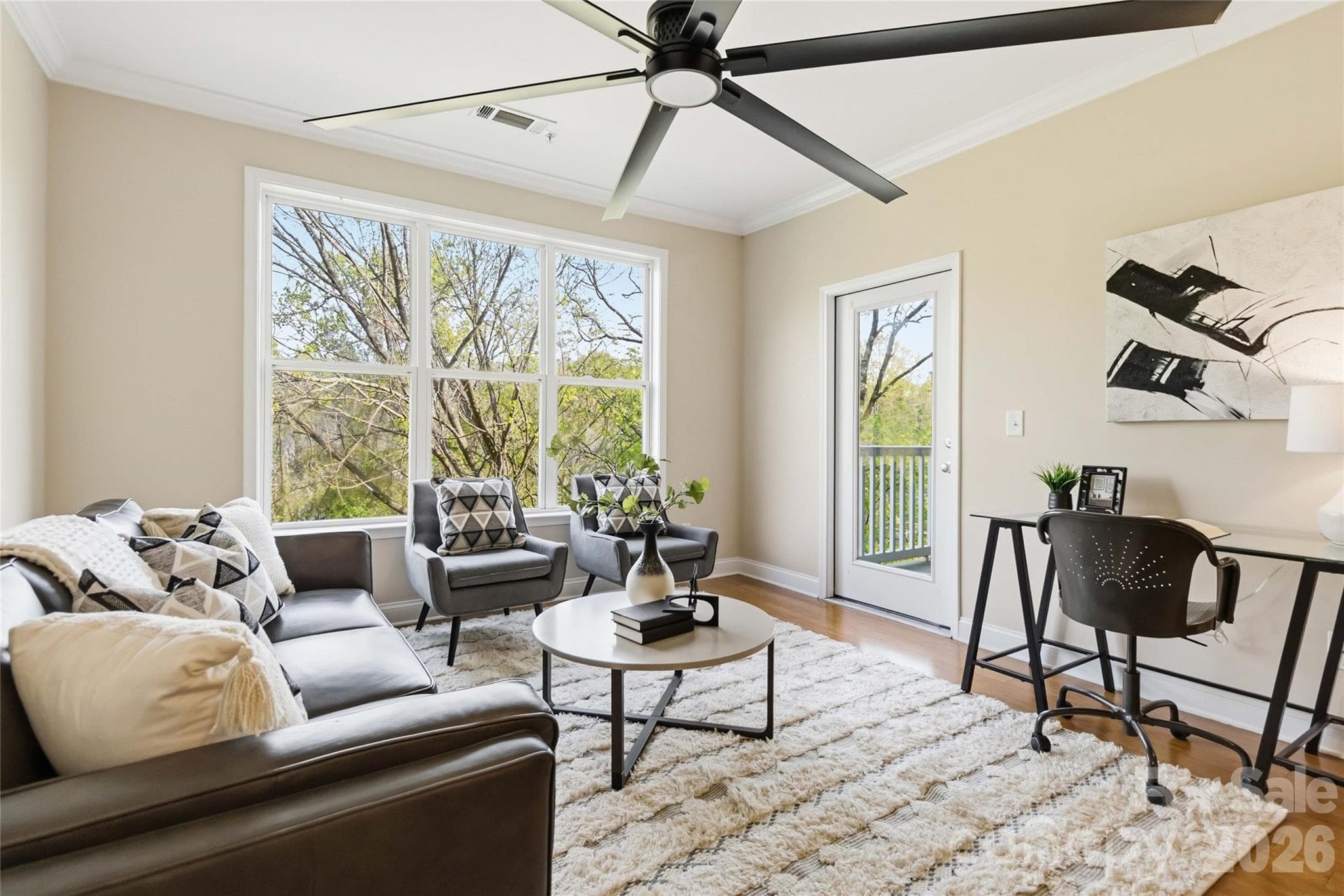 Staging has been removed, and the ceiling fan is now a smaller fan. - 1000 E Woodlawn Road, Charlotte