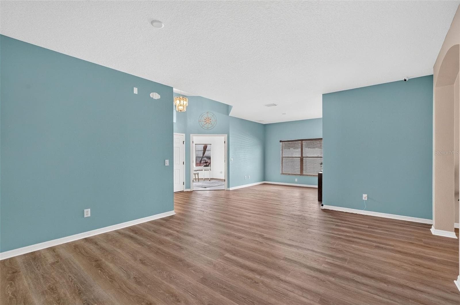 Formal dining looking back towards office and front door. - 319 19TH ST NW, RUSKIN
