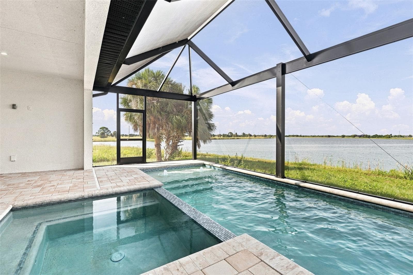 Resort-Style Pool & Spa with Serene Lake Views - 44 SUNFLOWER DR, PLACIDA