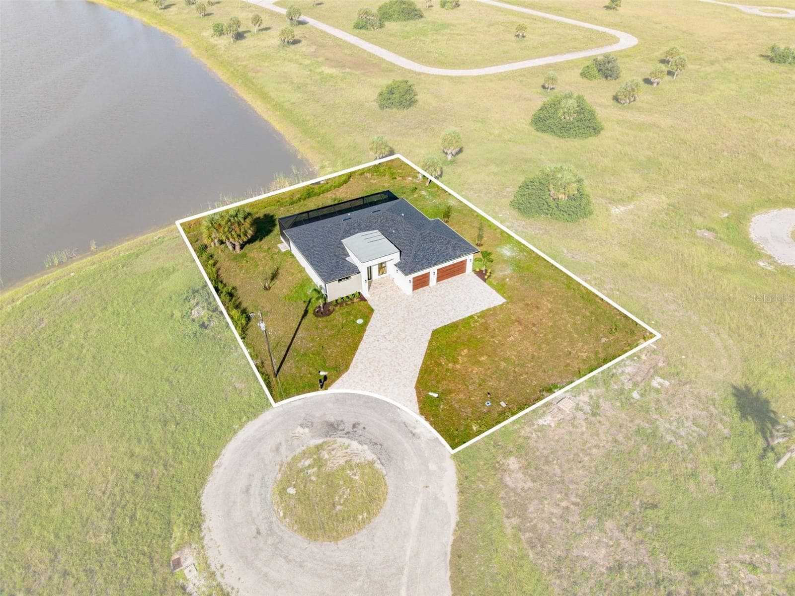 Private Cul-de-Sac Setting with Expansive Waterfront views - 44 SUNFLOWER DR, PLACIDA