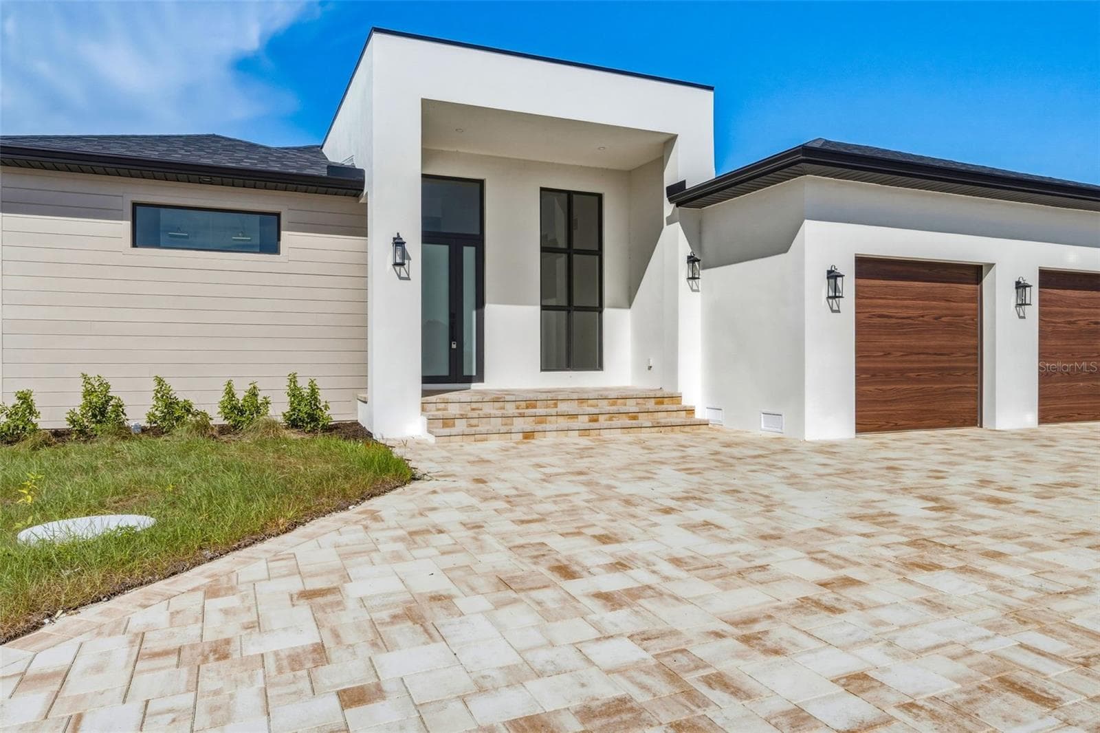 Impressive Front Elevation with Designer Architectural Details - 44 SUNFLOWER DR, PLACIDA