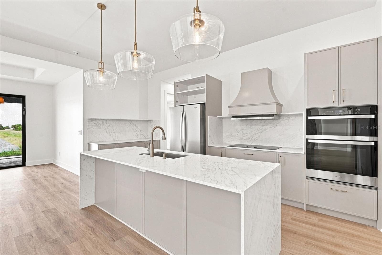 Luxury Kitchen with Waterfall Island & Waterfront Views - 44 SUNFLOWER DR, PLACIDA