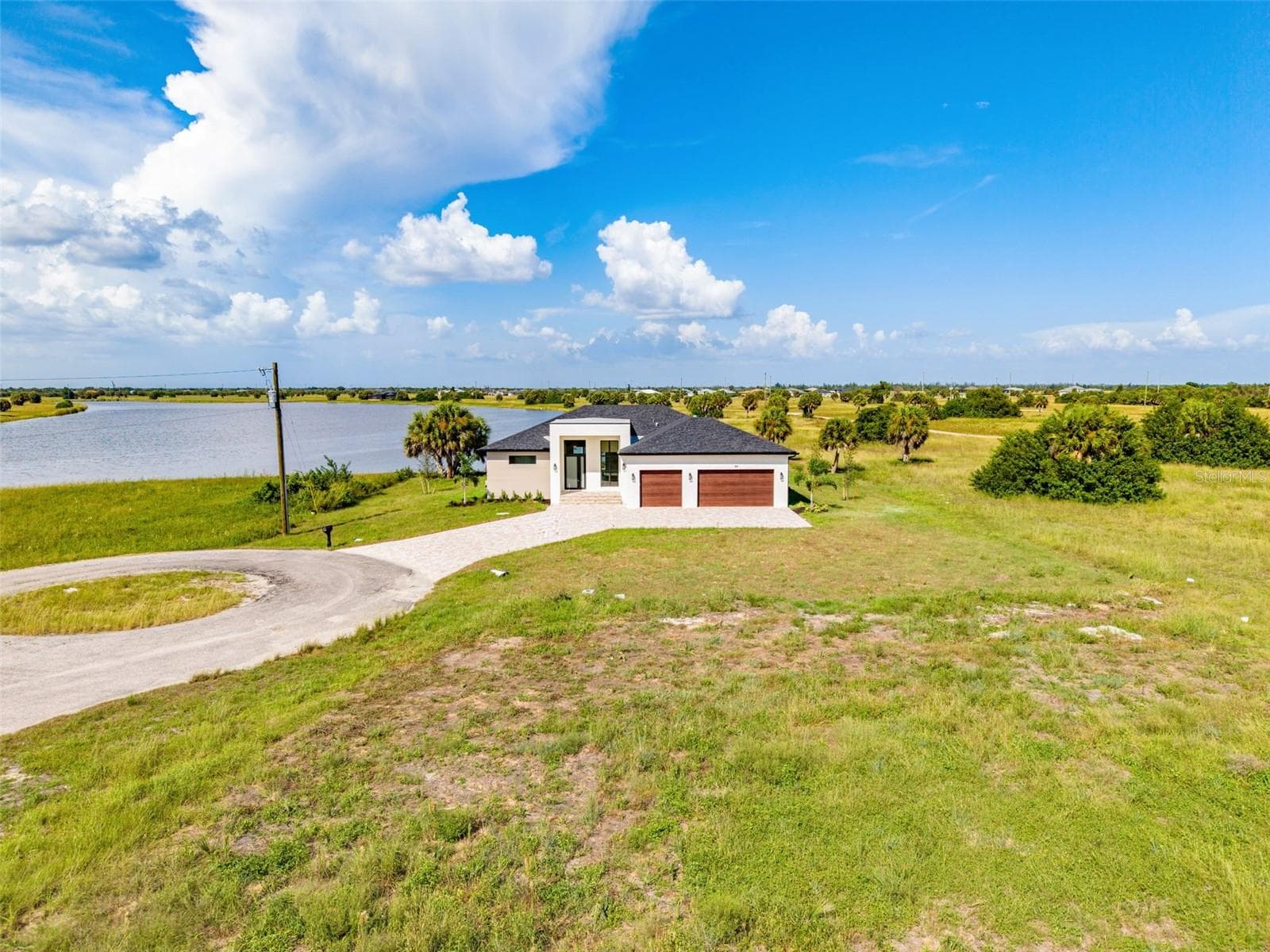Private Cul-de-Sac Setting with Panoramic Water Views - 44 SUNFLOWER DR, PLACIDA