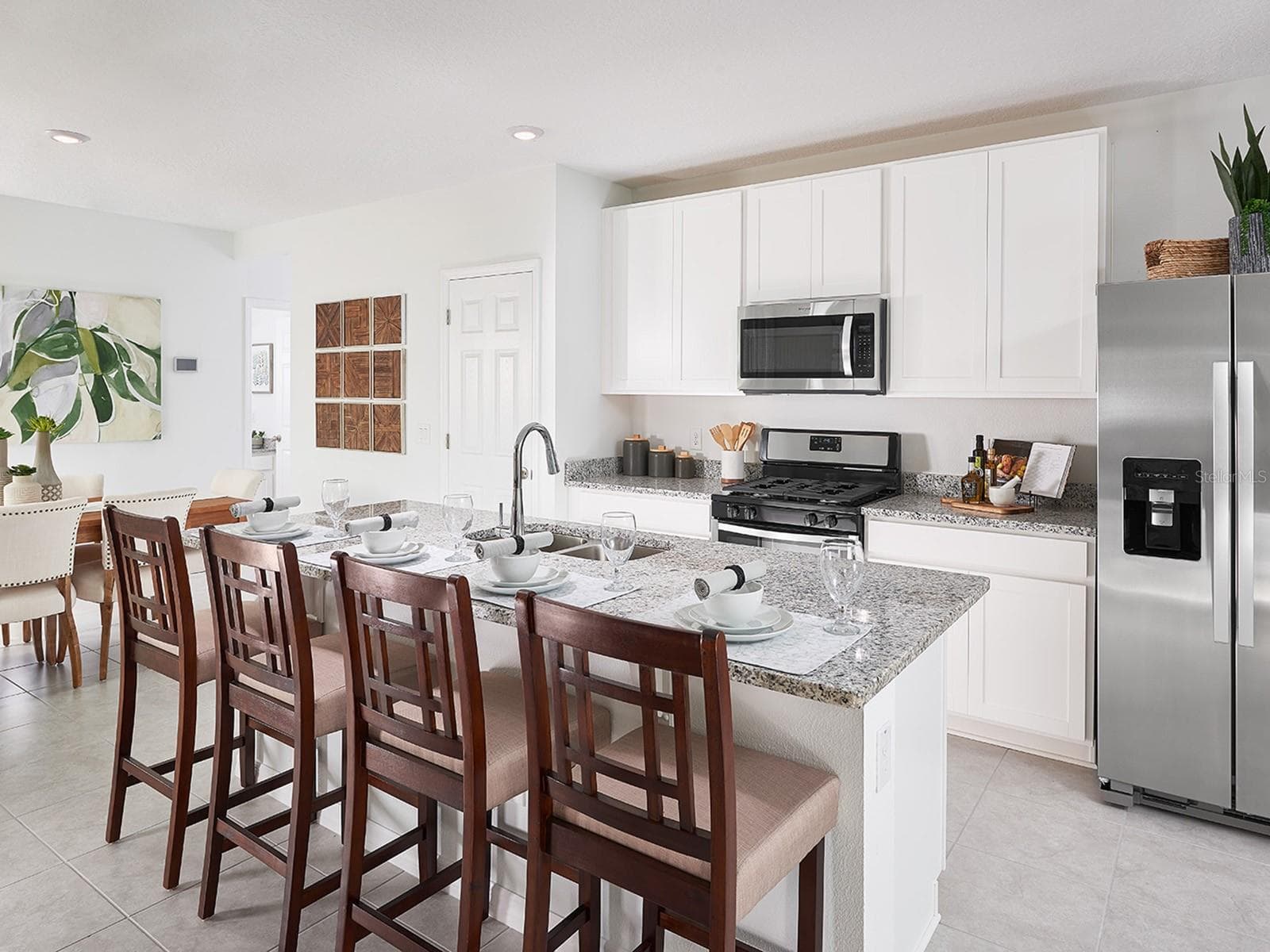 Photo is not of the actual home, but is an inspirational photo of builder’s model home and may depict options, furnishings, and/or decorator features that are not included. - 3377 LINGER LN, LAKE HAMILTON