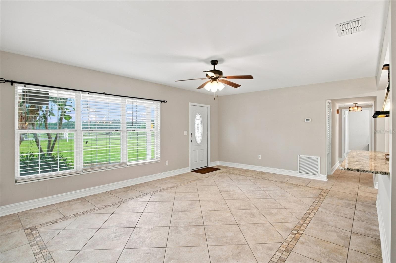 Living area main home - 5106 THONOTOSASSA RD, PLANT CITY
