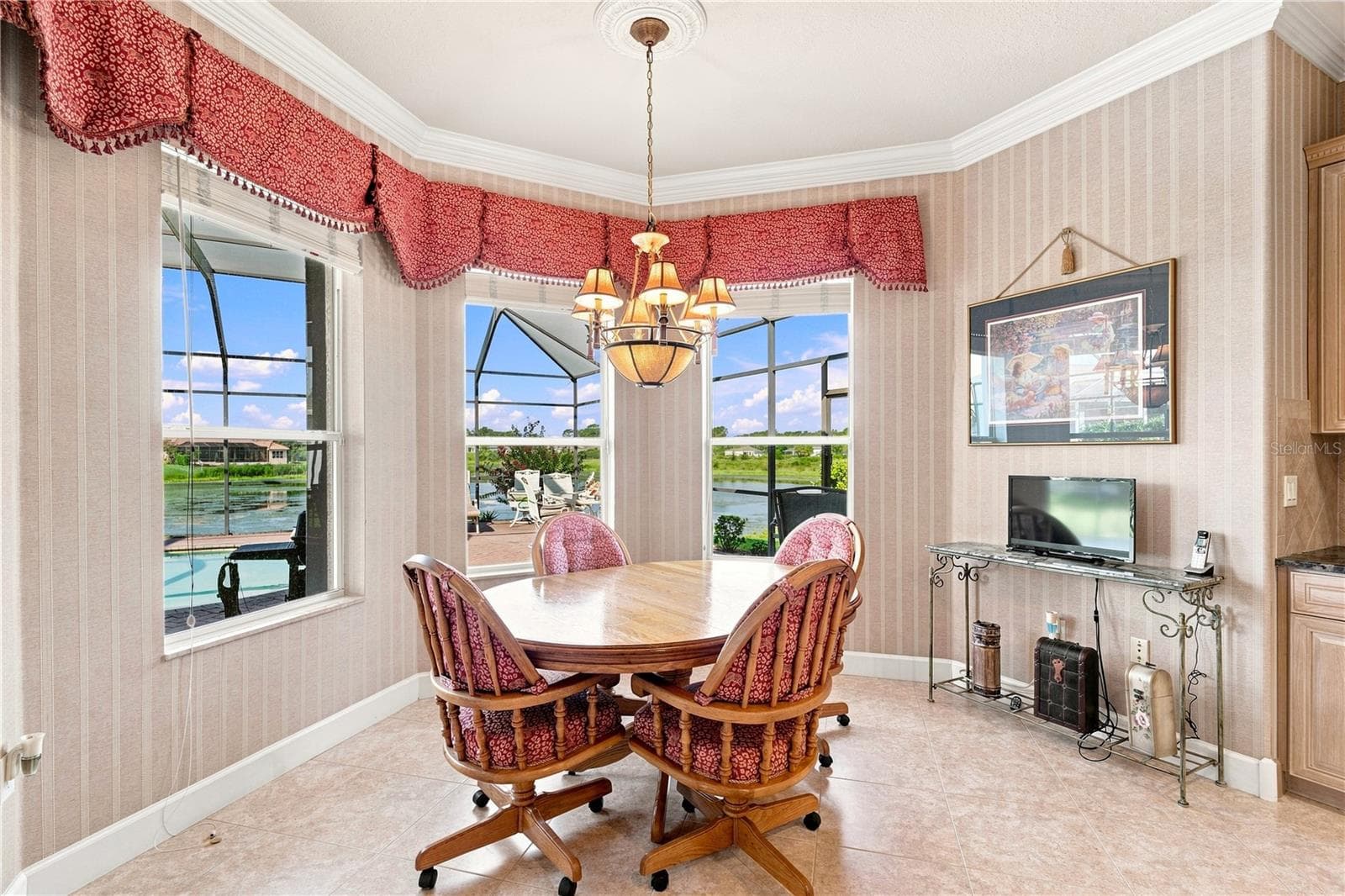 Breakfast nook with lake view - 9271 WESTSHORE DR, WEEKI WACHEE