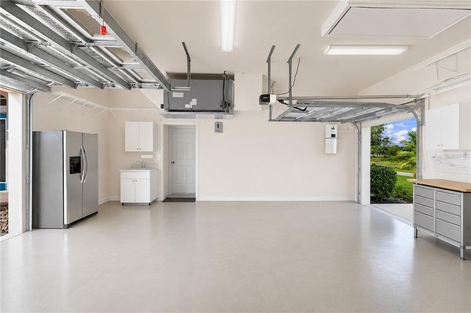 Two car garage, plus Golf Cart Separate entrance door - 9271 WESTSHORE DR, WEEKI WACHEE