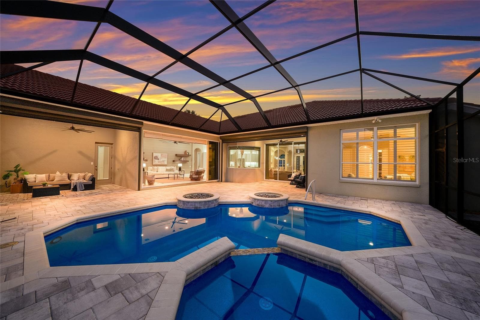 Large heated pool and spa recently resurfaced featuring state-of-the-art equipment, including a commercial-grade heater and energy-efficient pump - 8122 LONE TREE GLN, LAKEWOOD RANCH