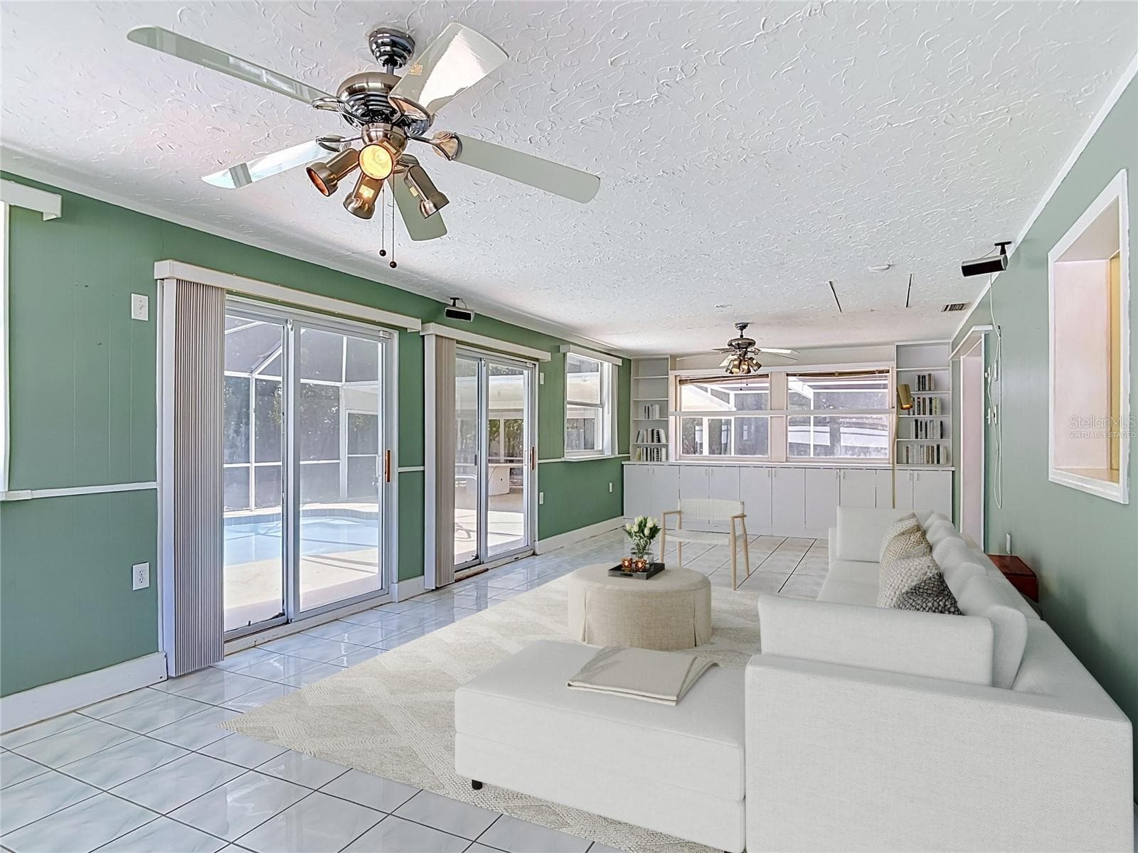 virtually staged Florida room - 1237 JEFFERY DR, PORT ORANGE