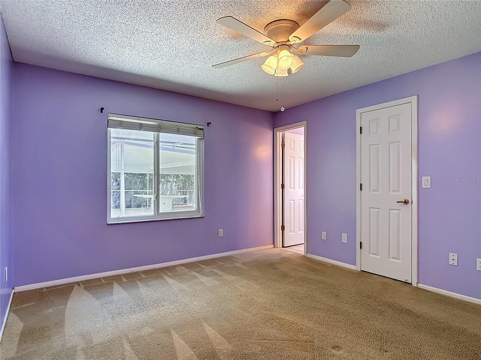 primary bedroom opens to the pool - 1237 JEFFERY DR, PORT ORANGE