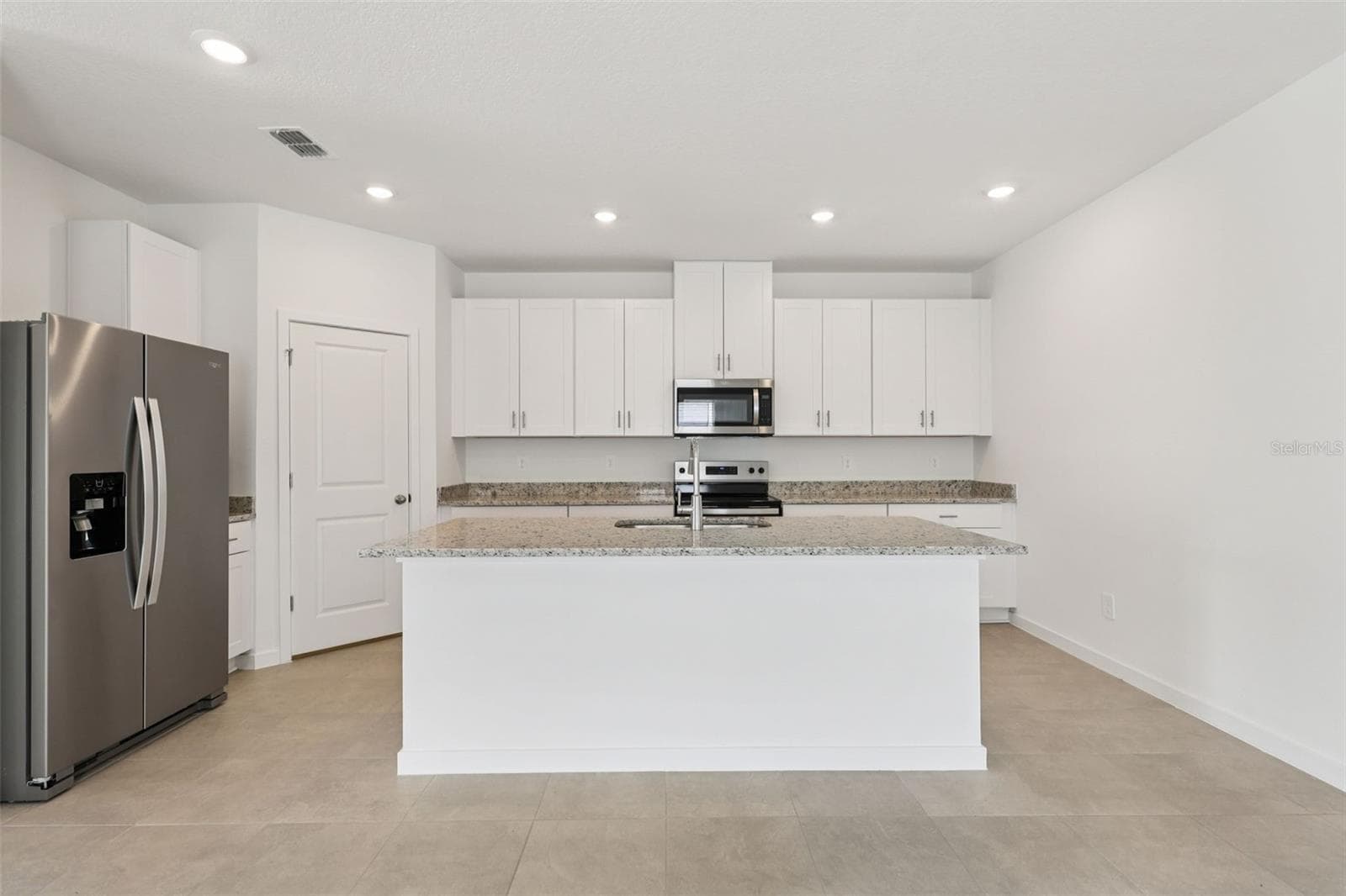 Photos are not of the actual home, but are photos of the builder home with same floorplan - 81 WANDERING CREEK WAY, PALM COAST