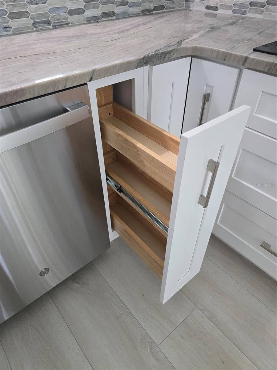 PULL OUT STORAGE DOOR - 7488 ELEANOR CIR, SARASOTA