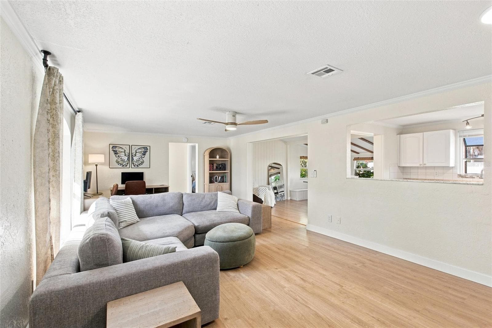 Living Room into Kitchen and Family/Florida Room - 1509 BANYAN DR, VENICE