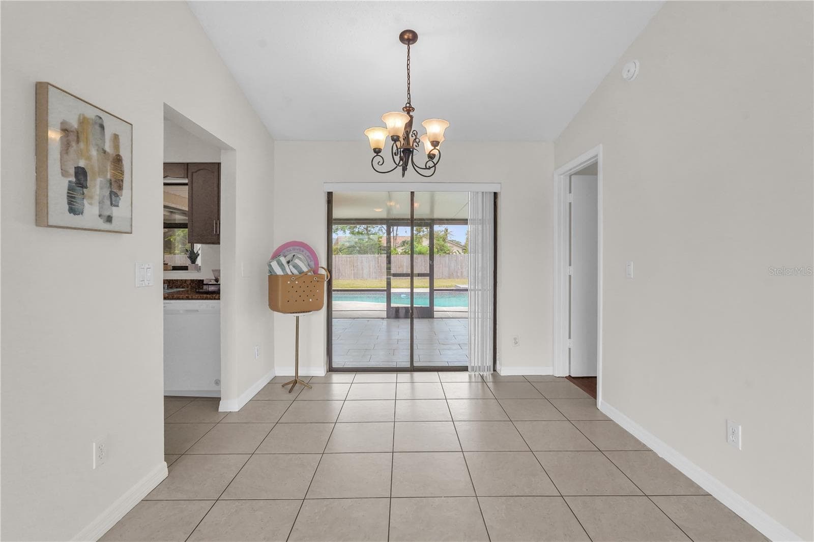 Dining space off of front living and sliding doors to take you to outdoor living - 5165 FORMBY DR, ORLANDO