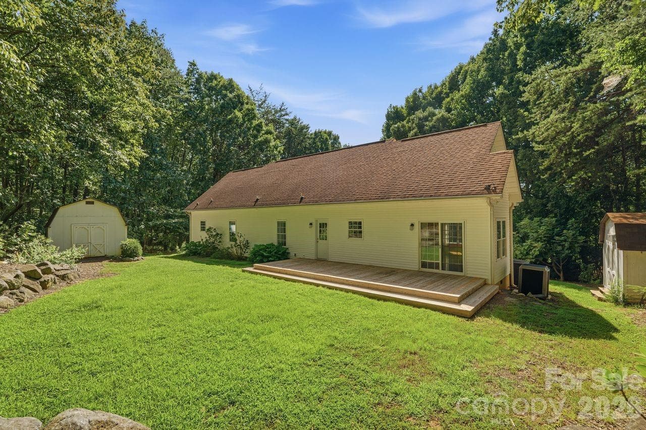 Rear view of home with expansive cedar deck - 5480 Liberty Hill Road W, York