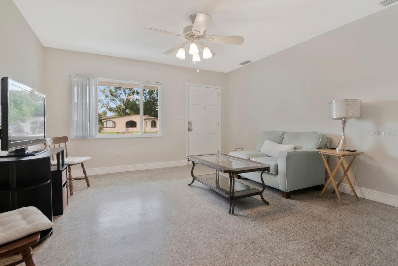Single Family Residence at 7713 W POWHATAN AVE, TAMPA, photo 8 of 38