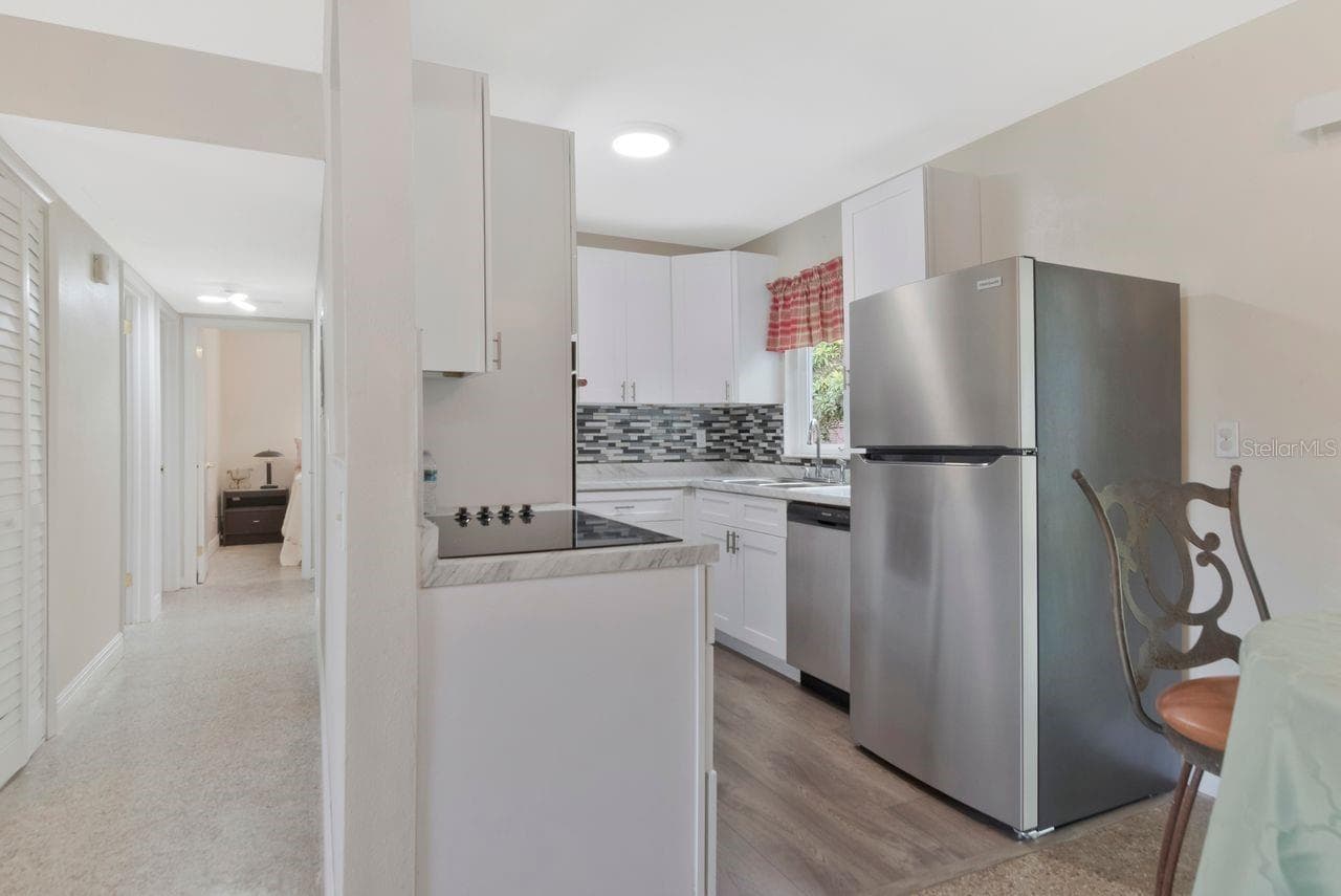Single Family Residence at 7713 W POWHATAN AVE, TAMPA, photo 13 of 38
