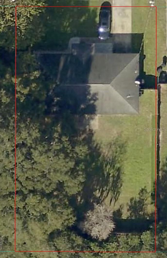 Rear fence line with trees creates buffer - 4188 SE 134TH PL, BELLEVIEW