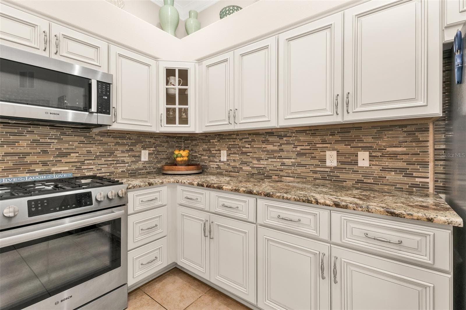 kitchen with gas stove - 2450 SILVER PALM RD, NORTH PORT
