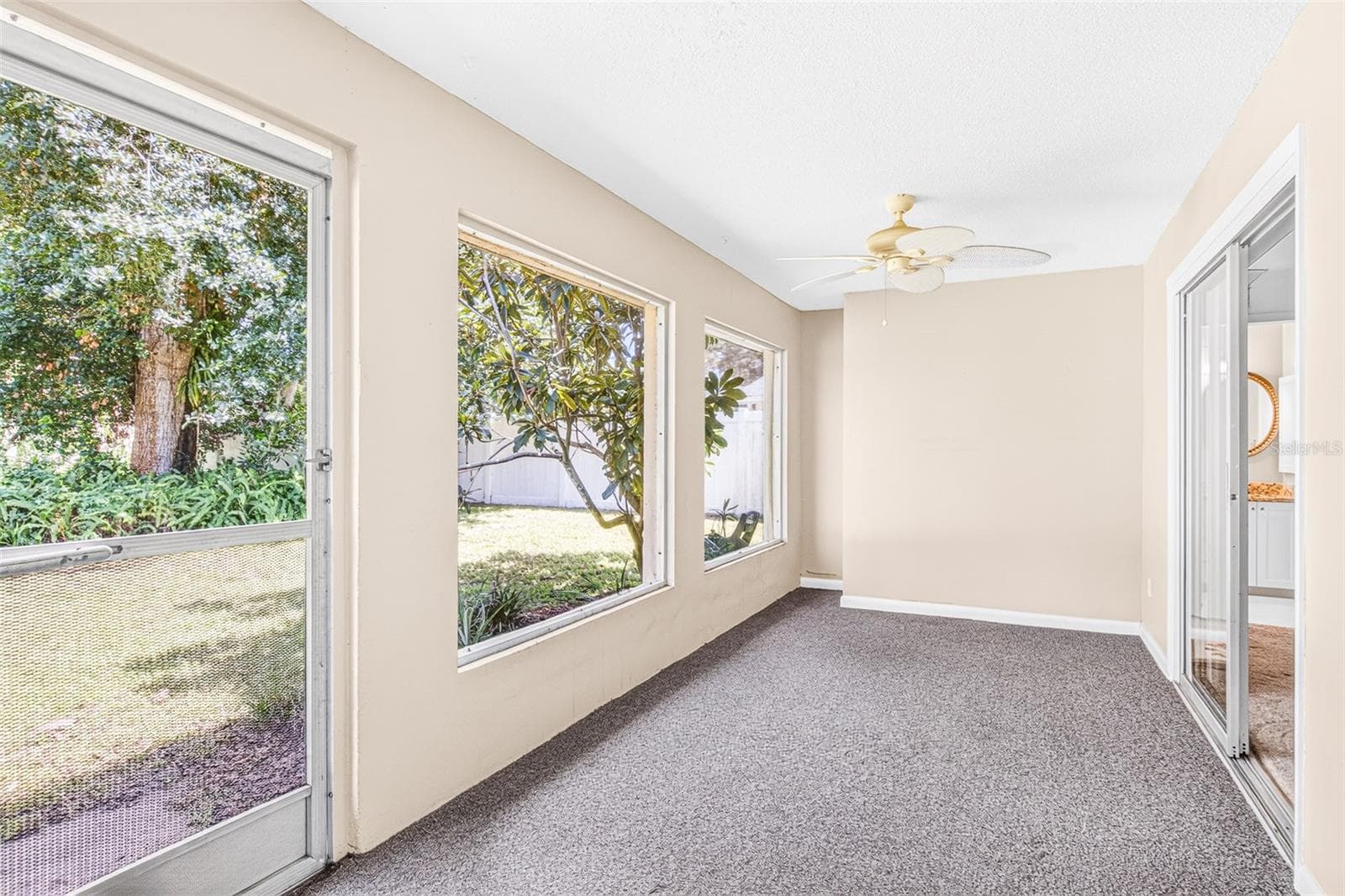 Enclosed porch - 301 VALENCIA CT, WINTER GARDEN