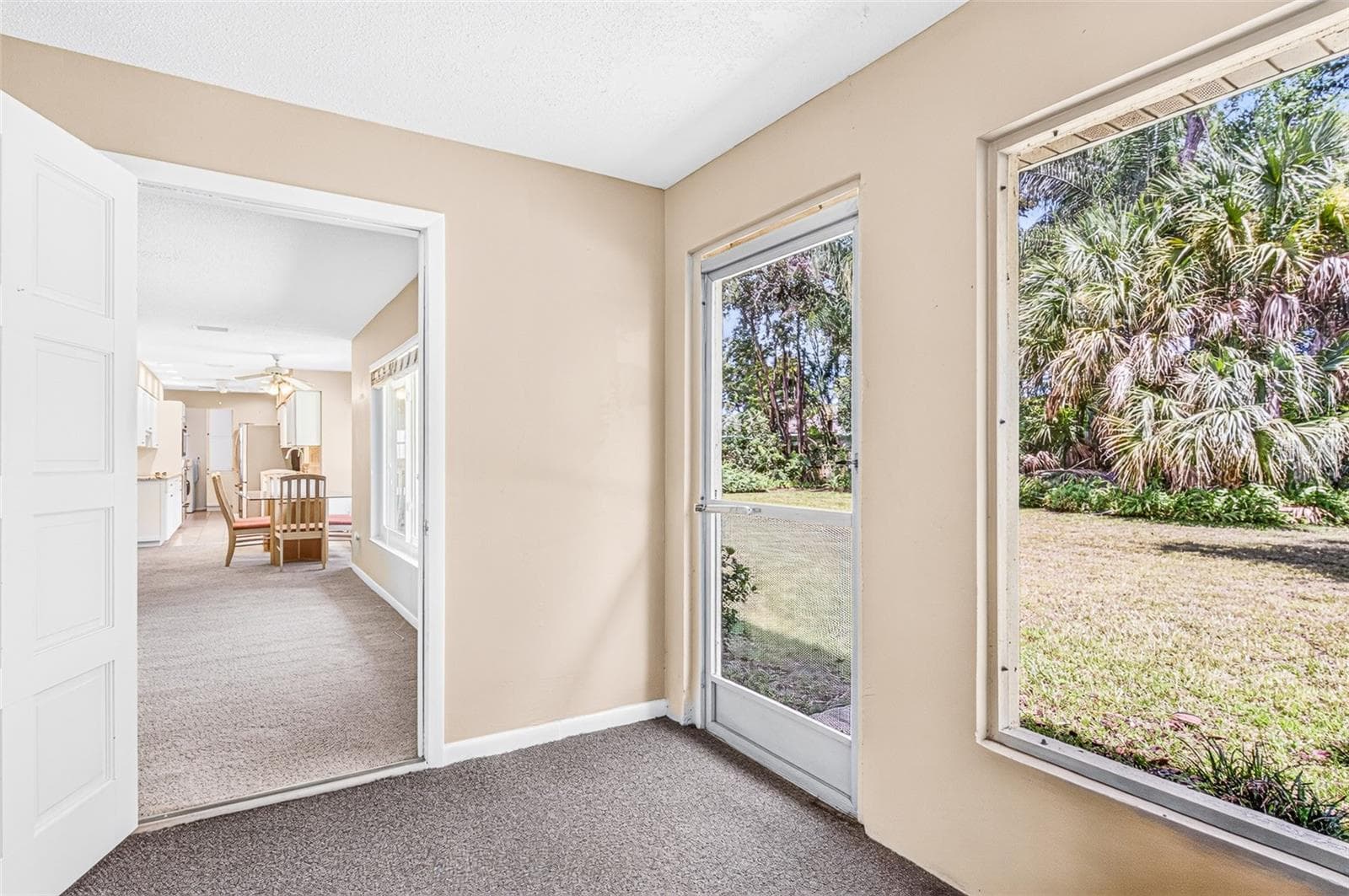 Enclosed porch to breakfast nook - 301 VALENCIA CT, WINTER GARDEN