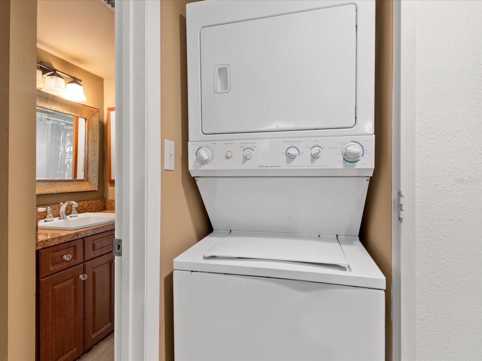 laundry closet - 19505 QUESADA AVE #107, PORT CHARLOTTE