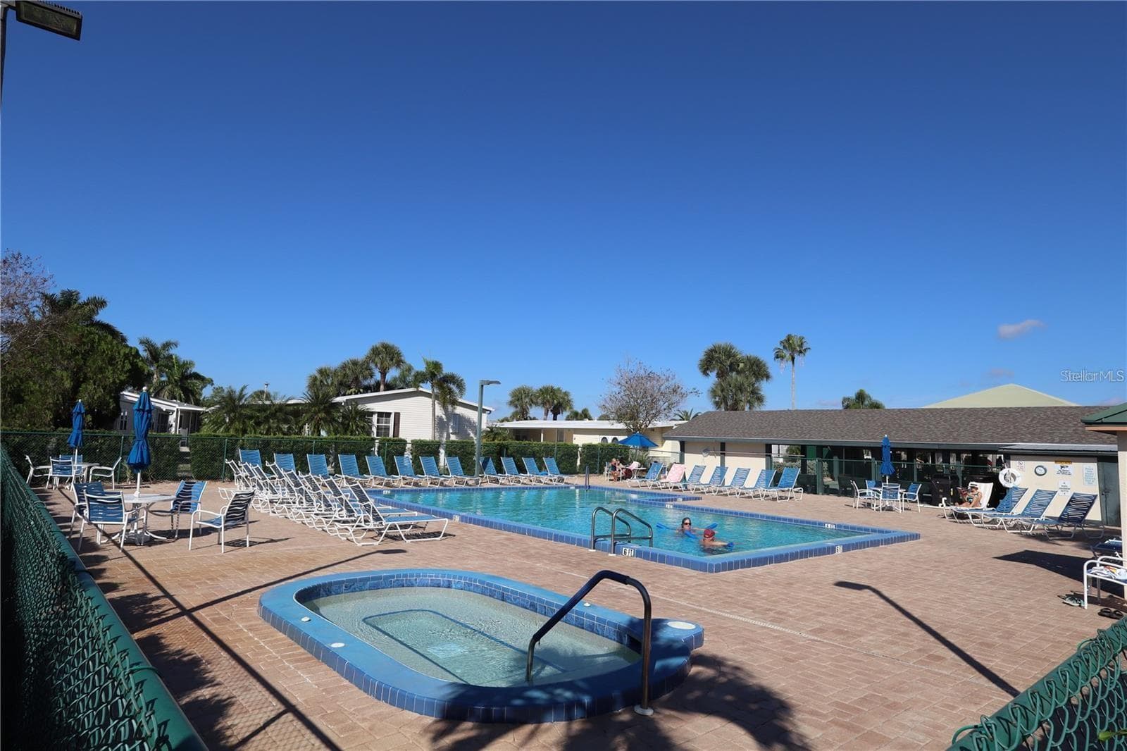 1 OF FOUR HEATED POOLS - 2100 KINGS HWY #144, PORT CHARLOTTE