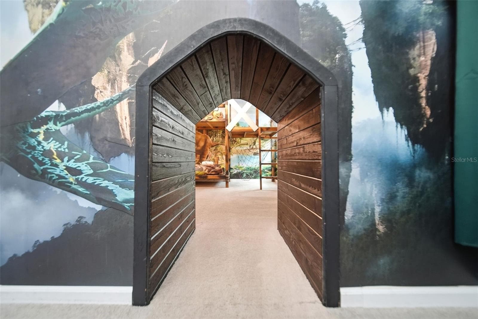 Crawl space between Jurassic Park & Avatar room (second level) - 2532 SHANTI DR, KISSIMMEE