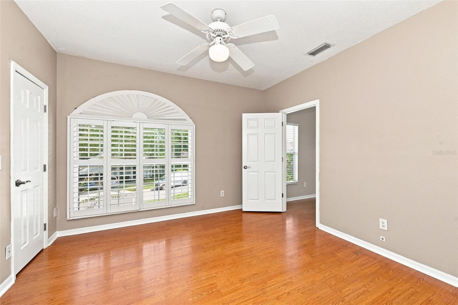Flexible Bedroom Connected to the Primary Suite offers exceptional versatility for a nursery, home office, gym, sitting room, or additional private living space. - 1349 VALLEY PINE CIR, APOPKA