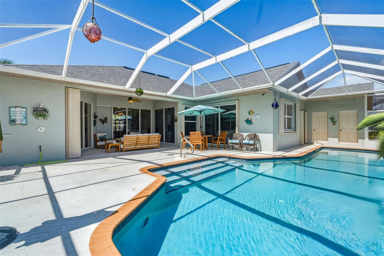 Spacious Patio with Plenty of Space for Entertaining - 136 PECKHAM ST SE, PORT CHARLOTTE