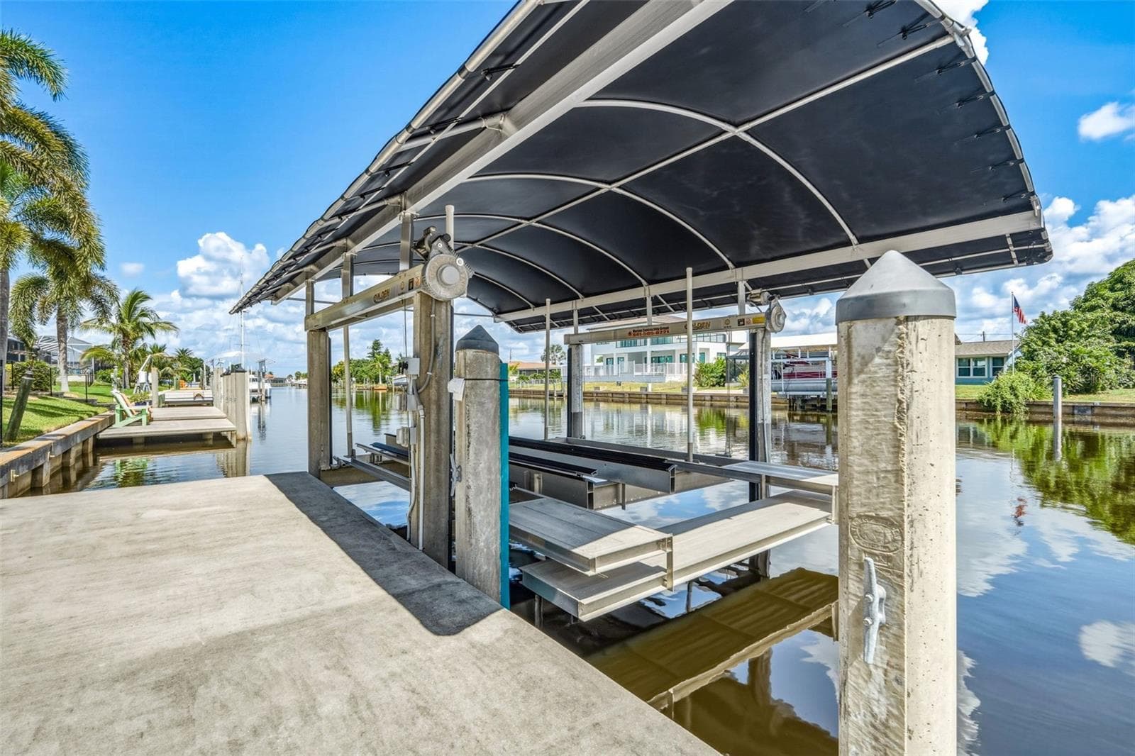 Covered Boat Lift with Quick Harbor Access - 136 PECKHAM ST SE, PORT CHARLOTTE