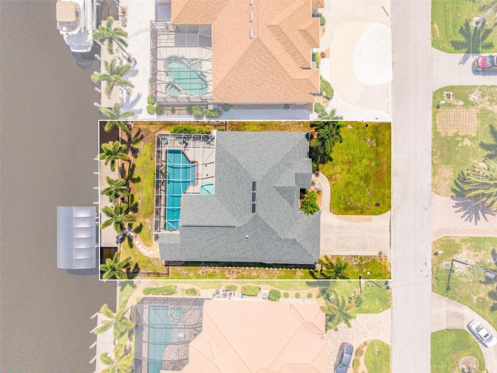 Overhead View of Home, Pool & Sailboat Canal - 136 PECKHAM ST SE, PORT CHARLOTTE