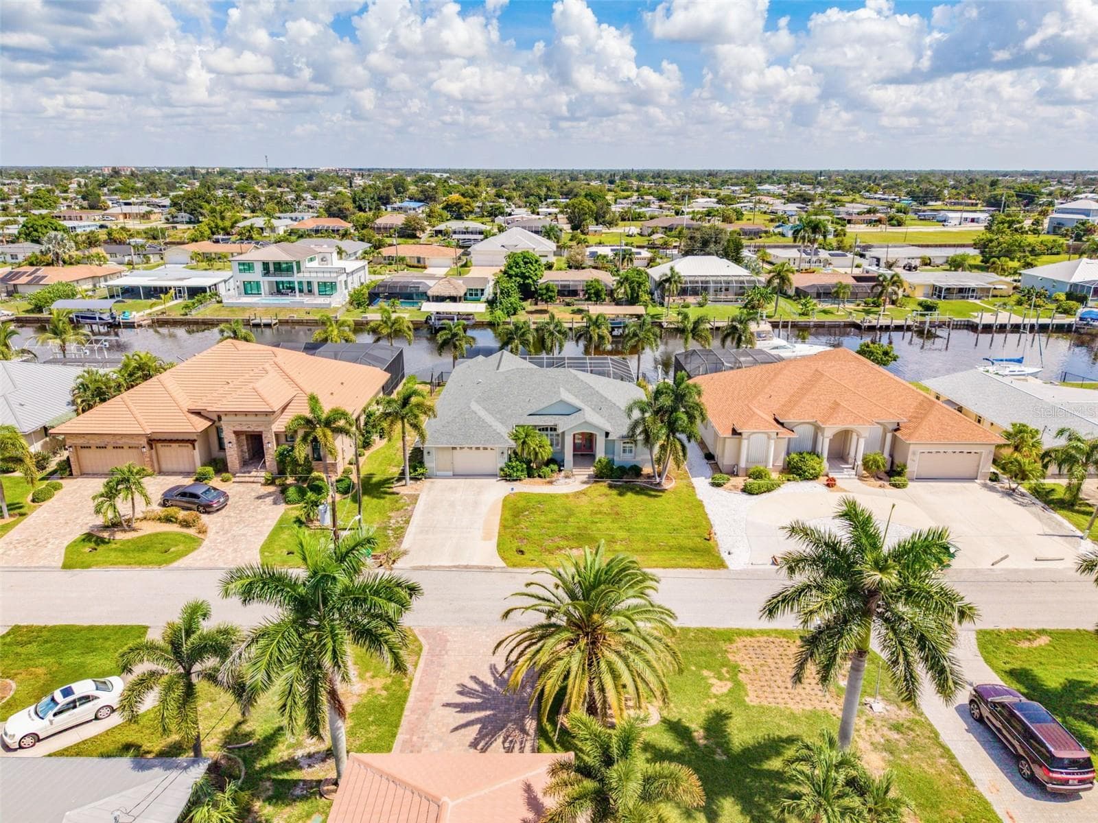 Aerial View of Home & Surrounding Neighborhood - 136 PECKHAM ST SE, PORT CHARLOTTE
