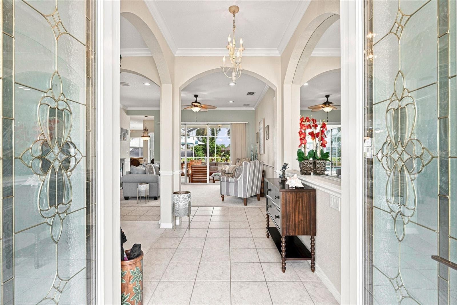 Elegant Foyer with Arched Details & Leaded Glass Double Doors - 136 PECKHAM ST SE, PORT CHARLOTTE