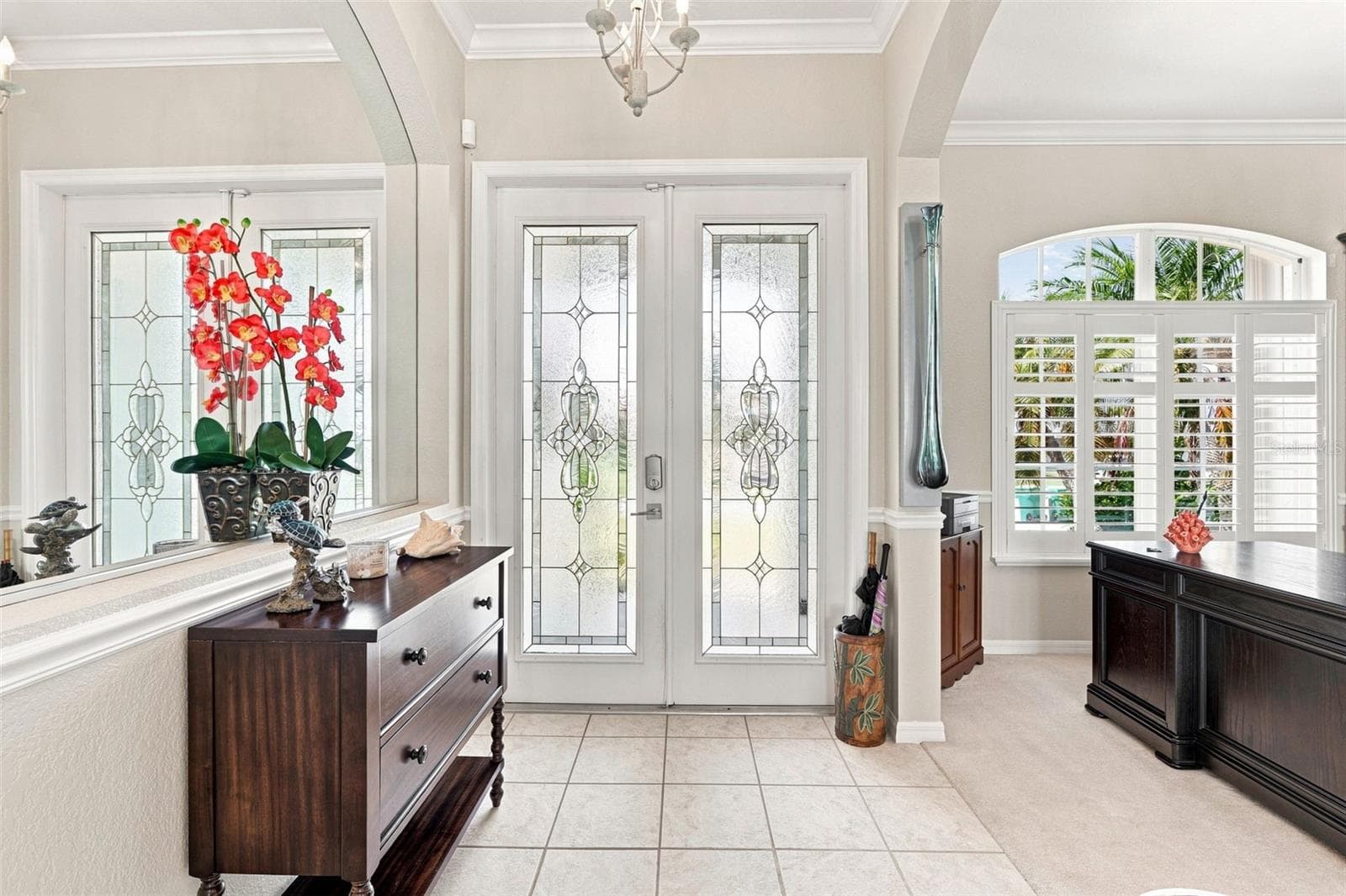 Grand Foyer with Abundant Natural Light Crown Molding - 136 PECKHAM ST SE, PORT CHARLOTTE