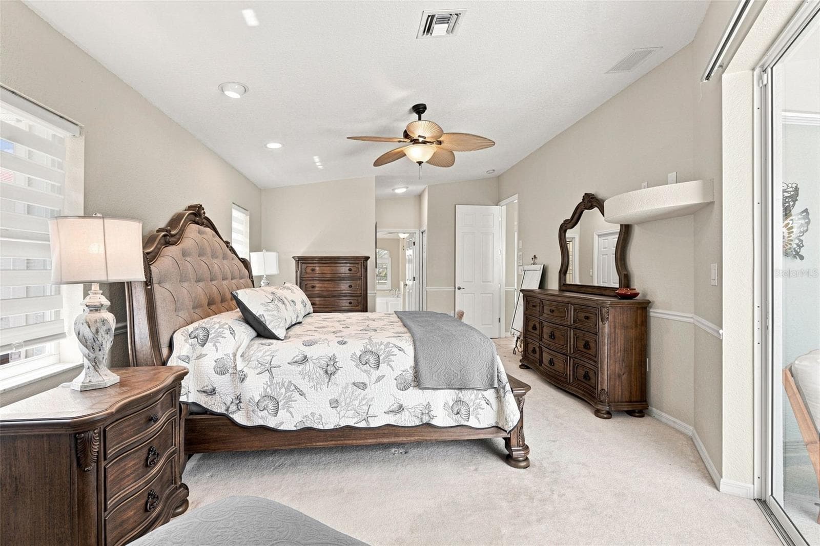 Spacious Primary Suite with Sliding Doors to Pool - 136 PECKHAM ST SE, PORT CHARLOTTE